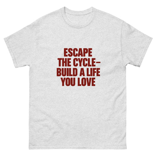 White motivational tee that reads “Escape the Cycle – Build a Life You Love” – change-driven apparel